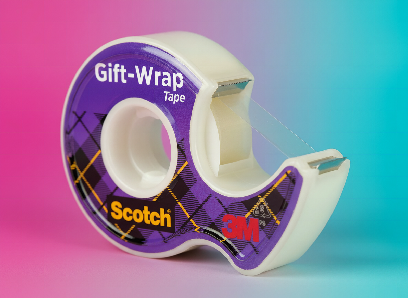 Macro close-up of Scotch invisible tape roll showing dispenser teeth and tape edge in sharp detail