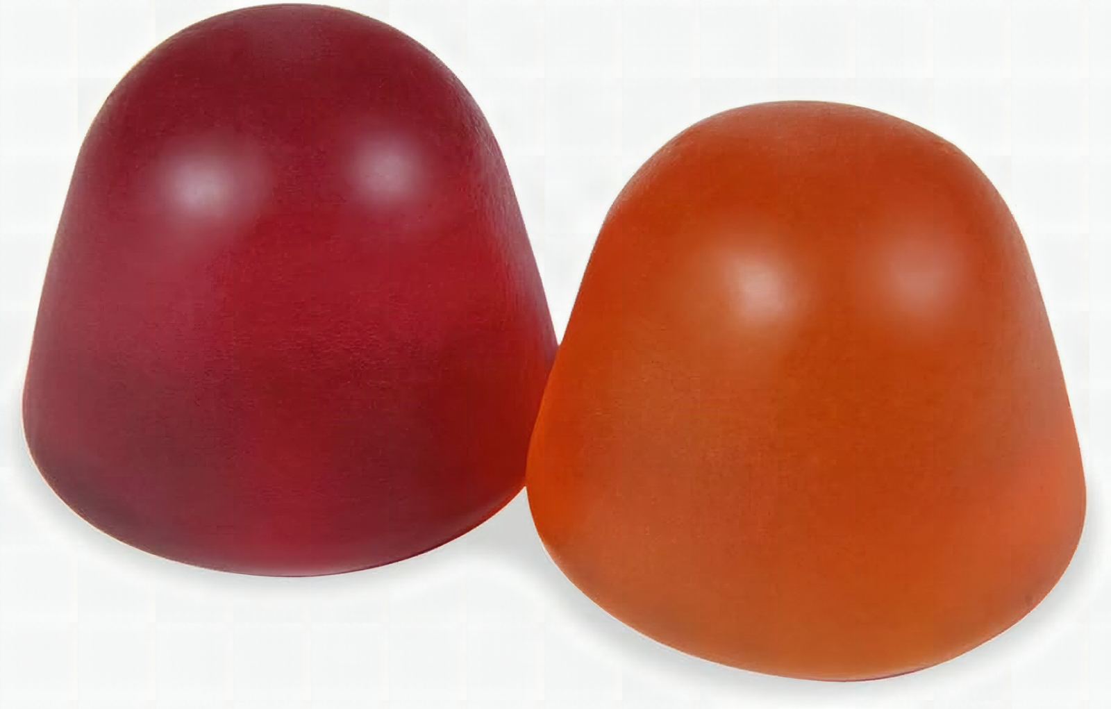Macro close-up of colorful Amazon Basics fiber gummies in orange, lemon, and strawberry, showing glossy texture detail