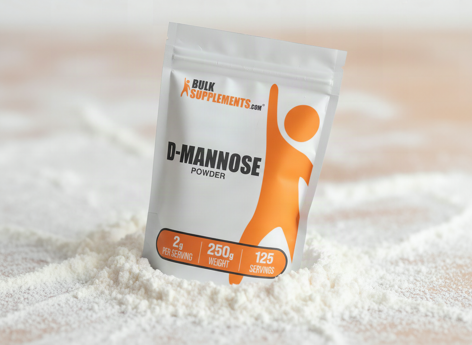 Macro close-up of D-Mannose powder crystals with fine granular texture and shallow depth of field