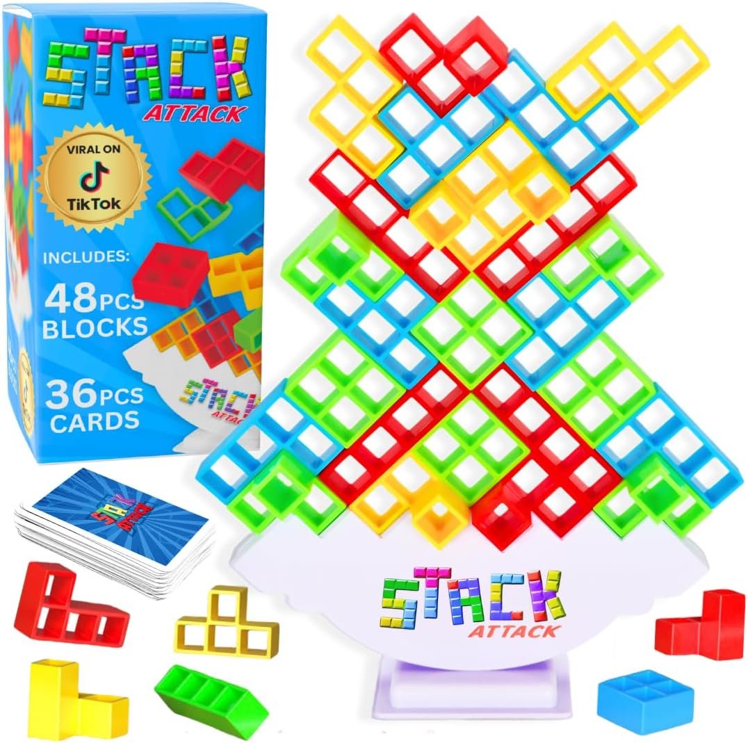 Macro close-up of colorful wooden blocks stacked in a tall tower, top pieces tilted precariously
