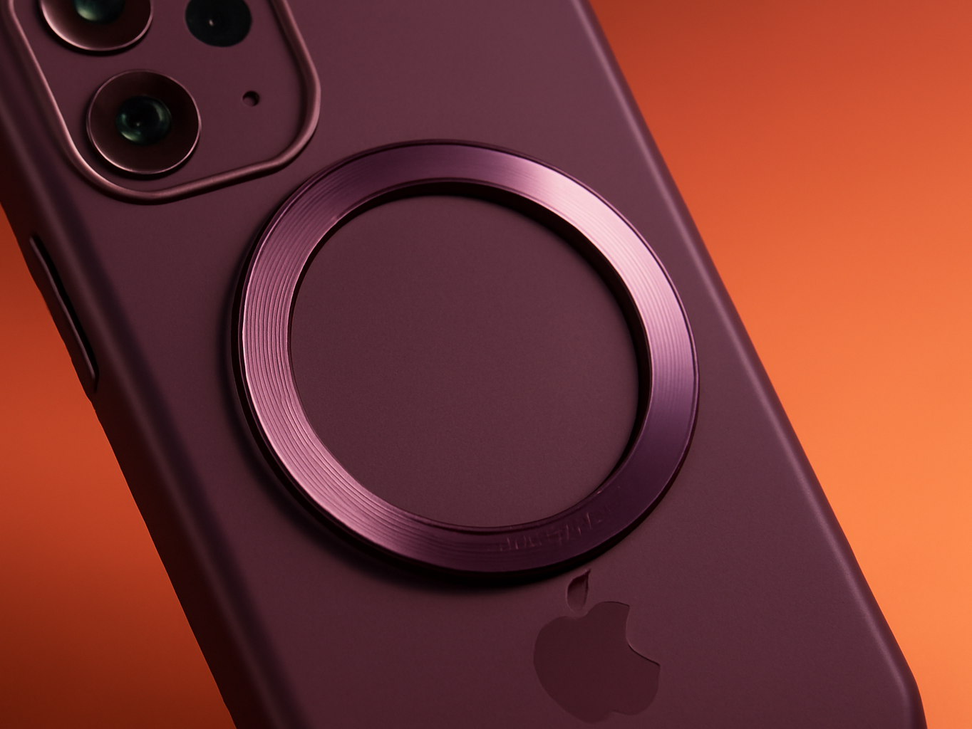 FNTCASE iPhone case with 360 magnetic ring in macro close-up, metallic ring detail sharp against blurred background
