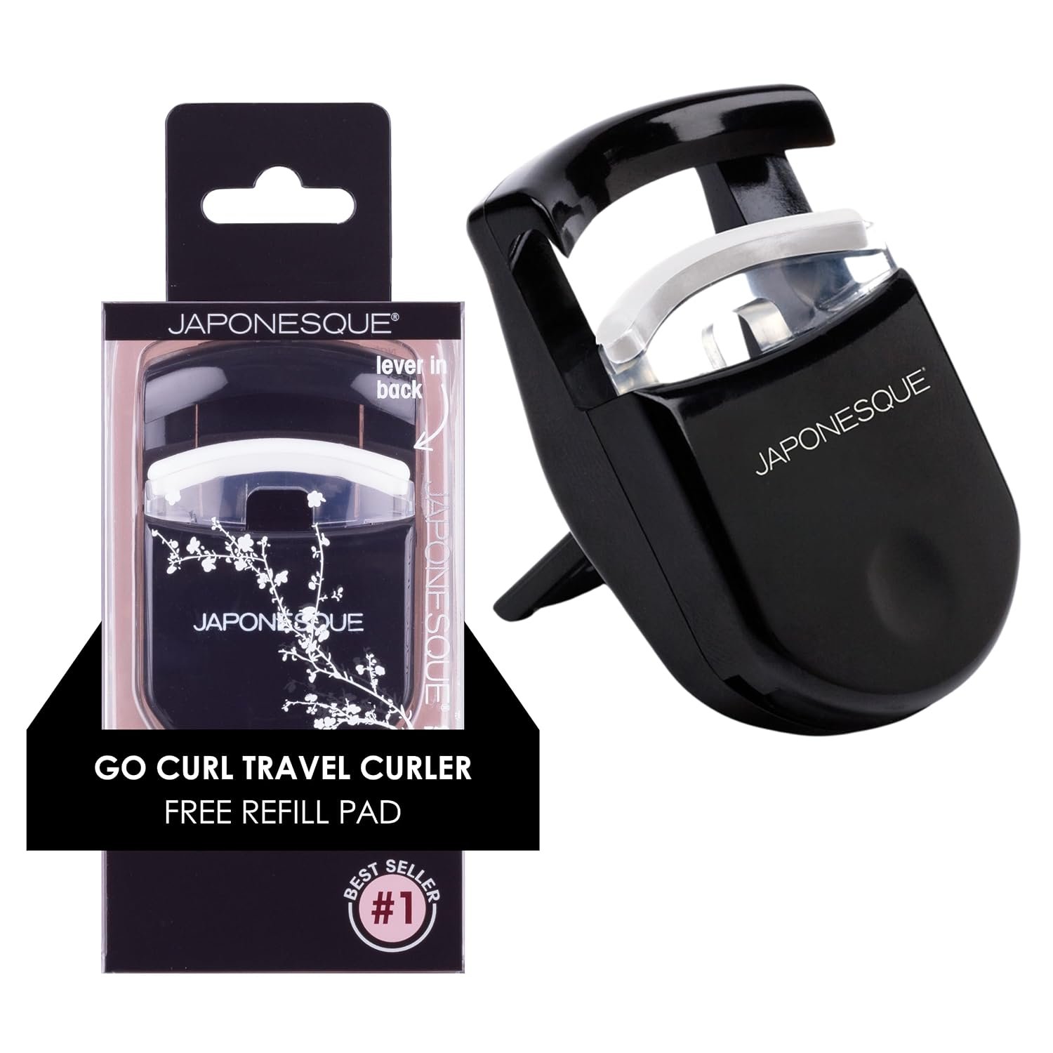 Macro close-up of the JAPONESQUE Travel Eyelash Curler's open cage and replaceable silicone pad in detailed focus