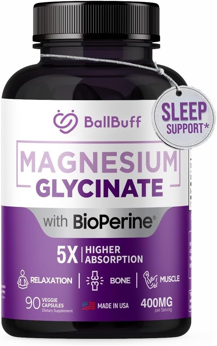 Magnesium glycinate supplement bottle on a nightstand with water glass and book in a bedroom