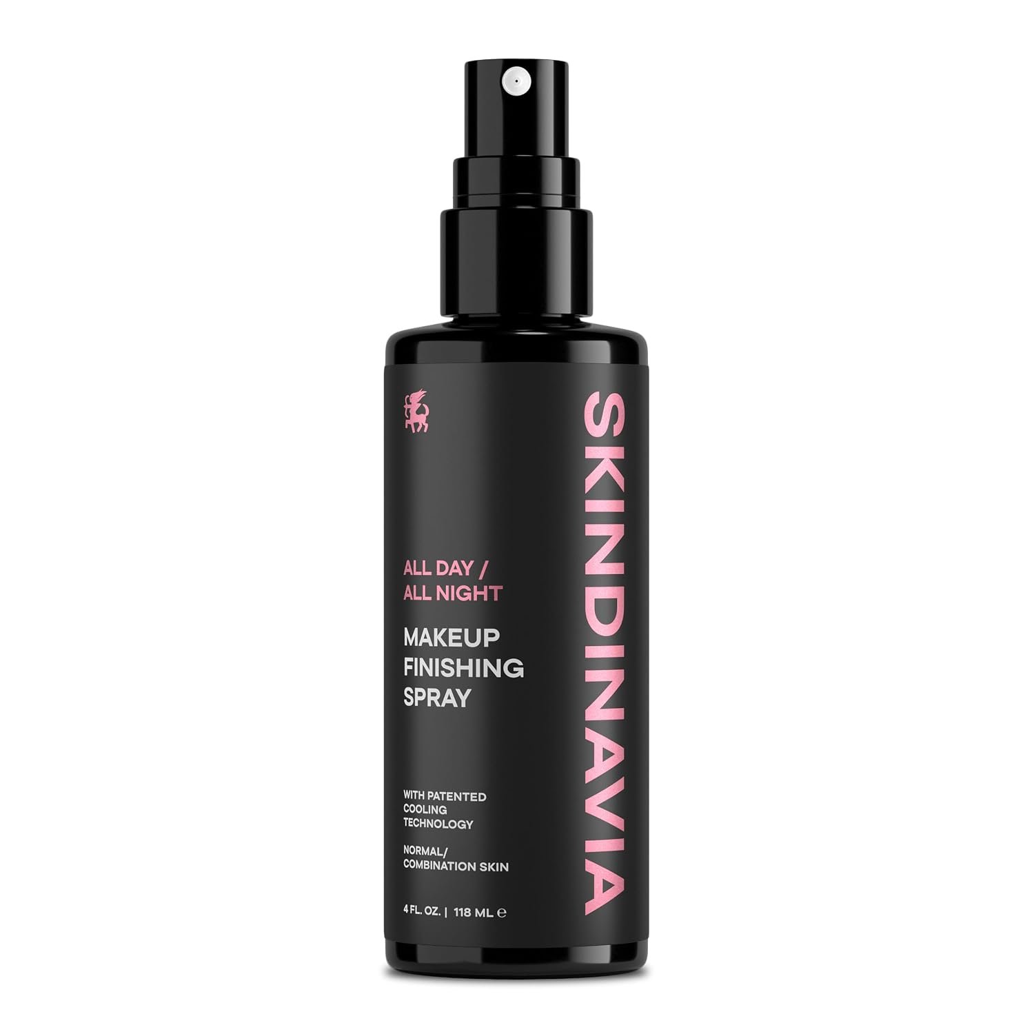 Skindinavia setting spray resting on a marble vanity surrounded by makeup tools and compacts in a bright bathroom