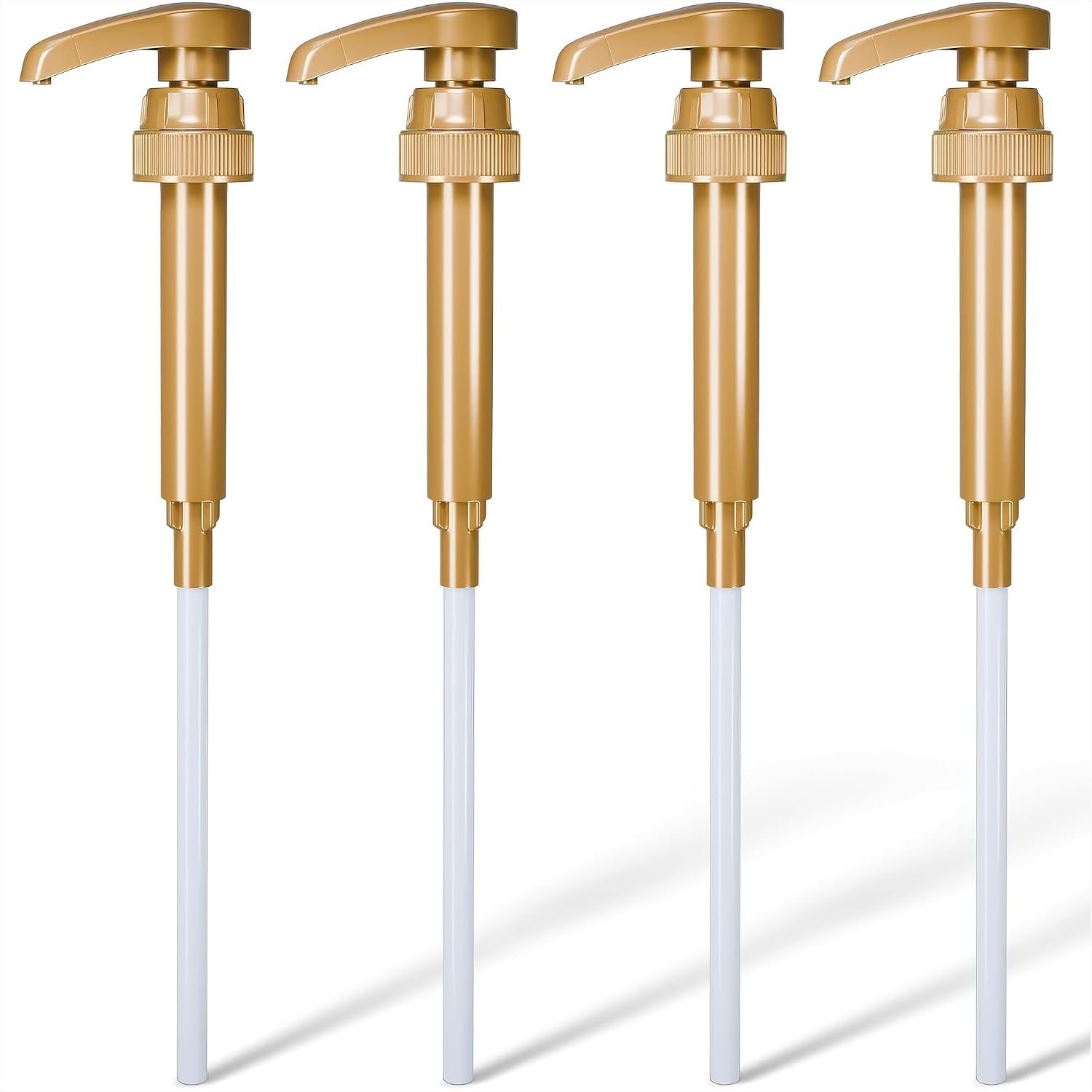 Four Alpenkok coffee syrup pumps in tight macro view showing metal pump heads and plastic bodies