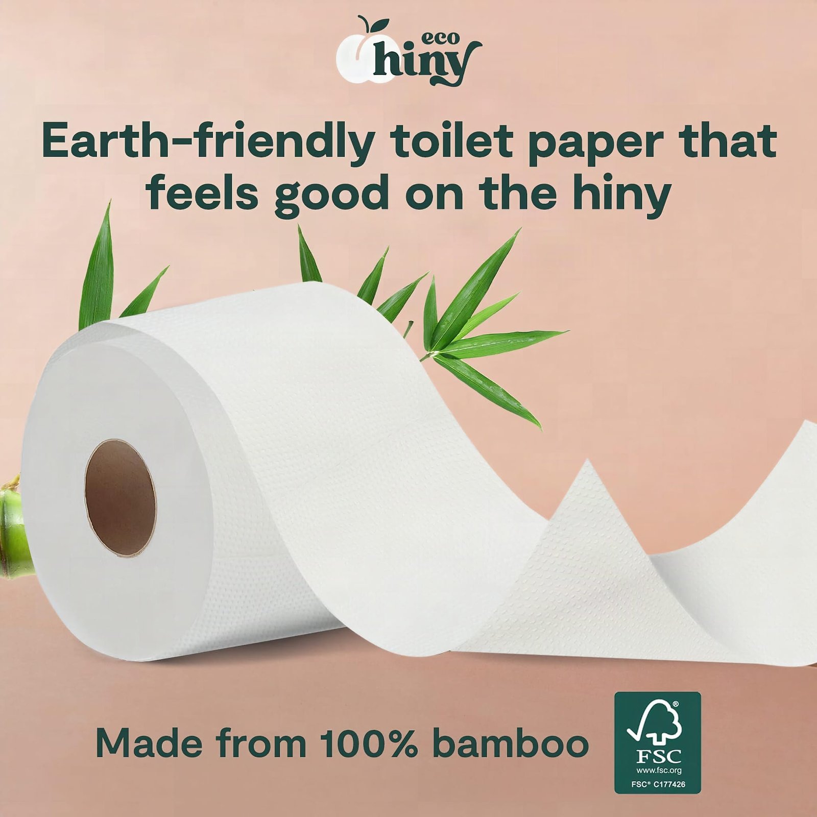 Macro detail of ecoHiny bamboo toilet paper showing 3-ply sheet texture and natural fiber structure