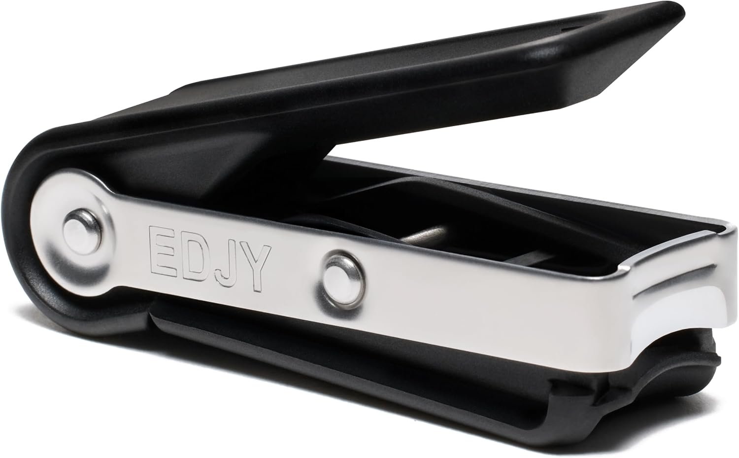 EDJY nail cutter on a bathroom vanity counter with toiletries and plant in natural daylight
