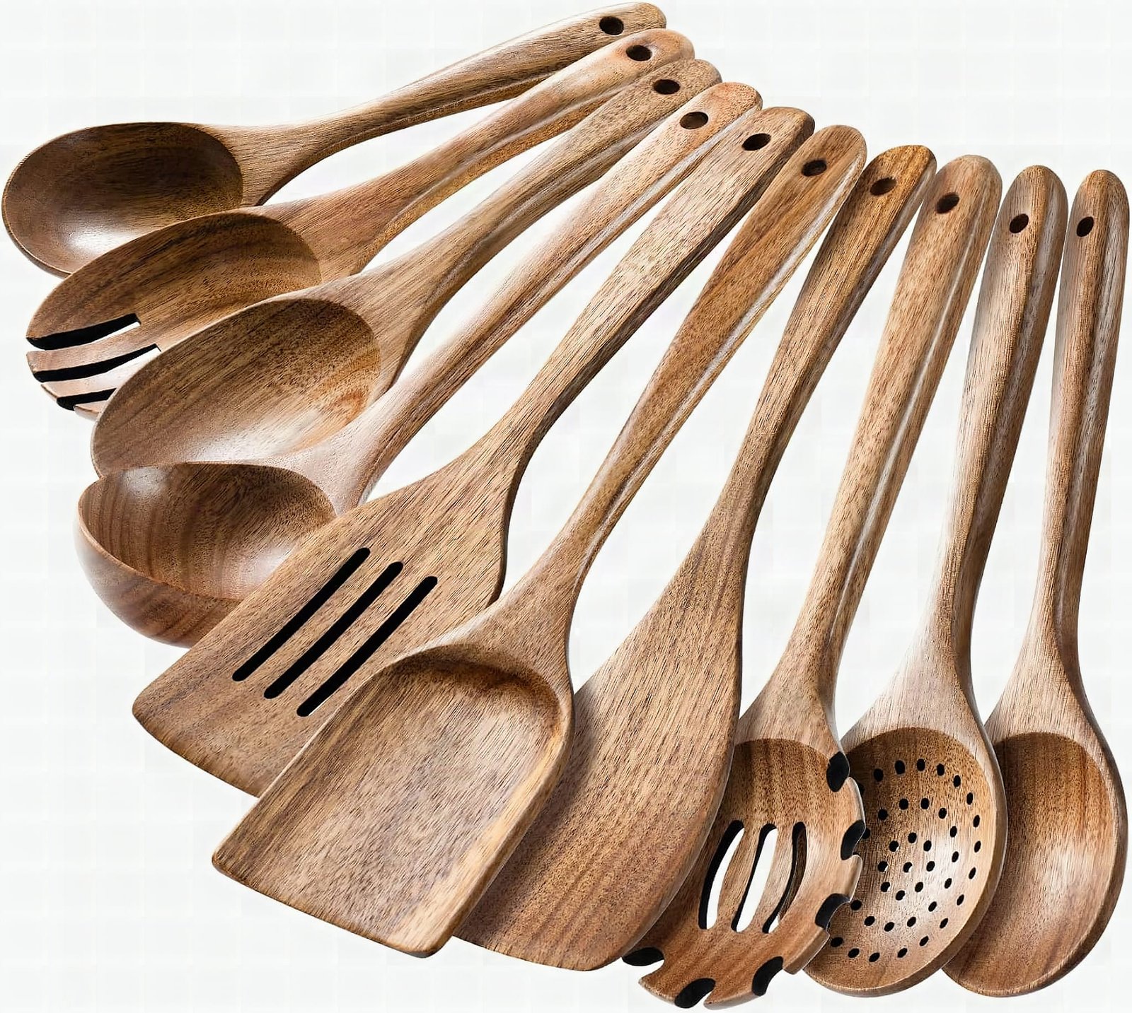 Macro close-up of an acacia wooden spoon showing detailed grain texture and warm wood finish