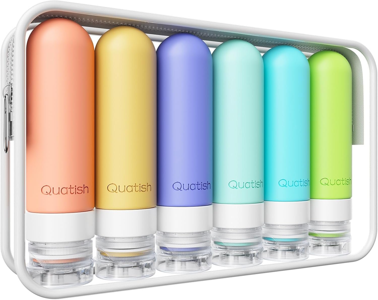 Six Quatish travel bottles packed inside an open backpack on forest ground surrounded by camping gear and dappled tree light